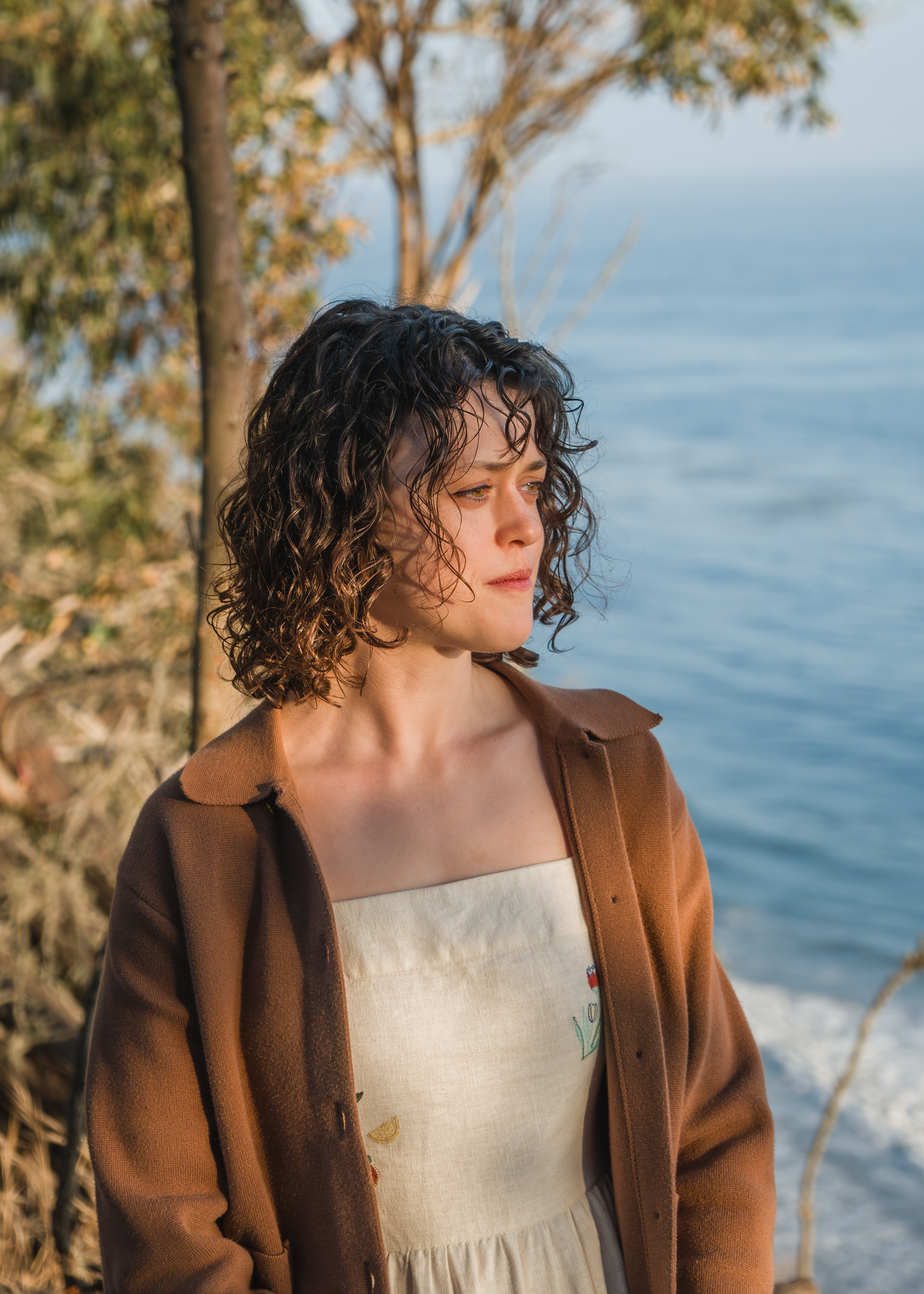Kaitlin Miller standing on a coastal overlook in Los Angeles
